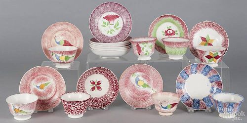 Eight spatterware cups and saucers, 19th c., to include three peafowl