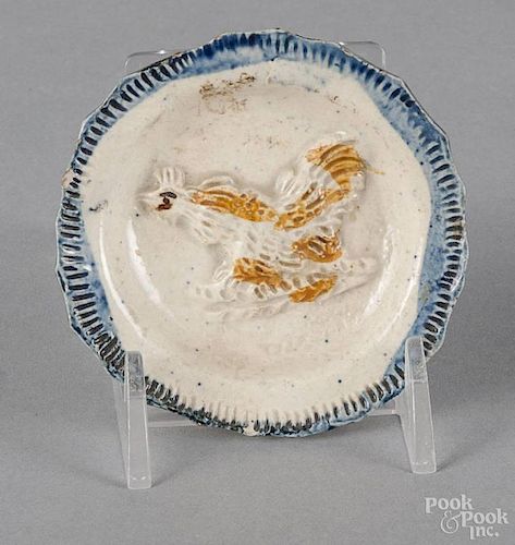 Miniature Leeds blue feather edge plate, early 19th c., with relief decoration of a chicken