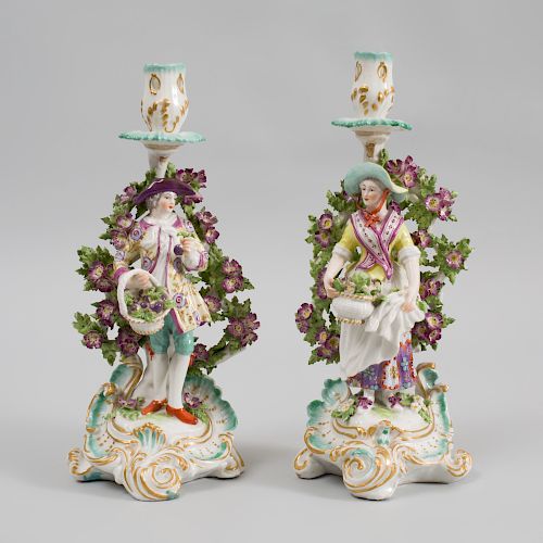 Pair of Chelsea Gold Anchor Porcelain Figural Candlesticks