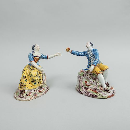 Pair of Dutch Polychrome Delft Figures of a Seated Gallant and Companion