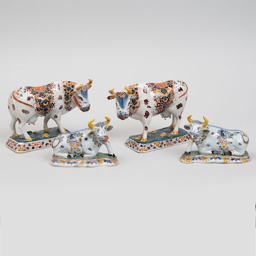 Two Pairs of Dutch Polychrome Delft Models of Cows
