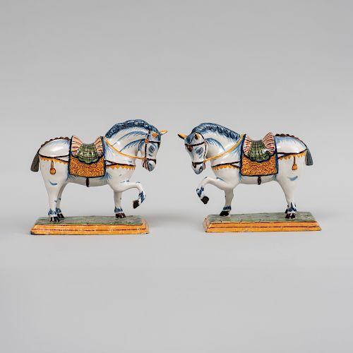 Pair of Small Dutch Delft Models of Prancing Horses