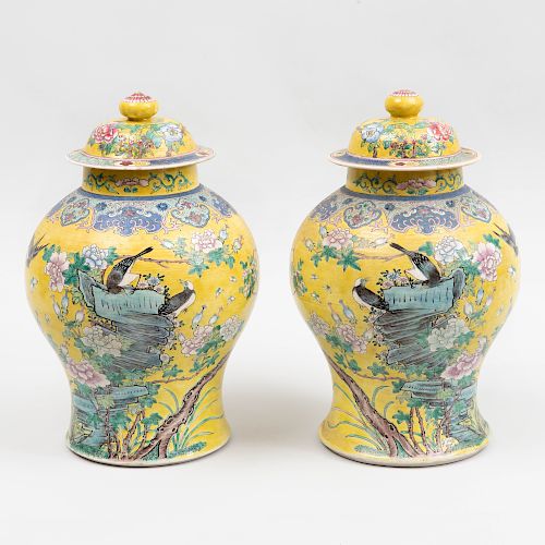 Pair of Chinese Yellow Ground Famille Rose Porcelain Baluster Form Jars and Covers