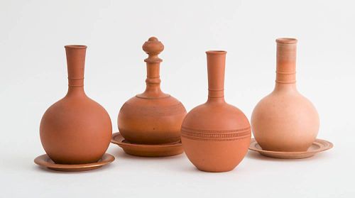 FOUR ENGLISH UNDECORATED TERRACOTTA WATER BOTTLES