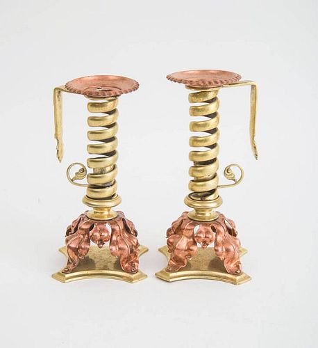 PAIR OF ENGLISH ARTS AND CRAFTS COPPER AND BRASS CANDLESTICKS