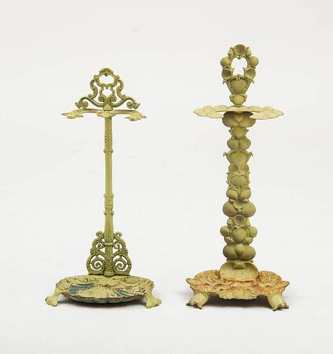 TWO PAINTED CAST-IRON UMBRELLA STANDS
