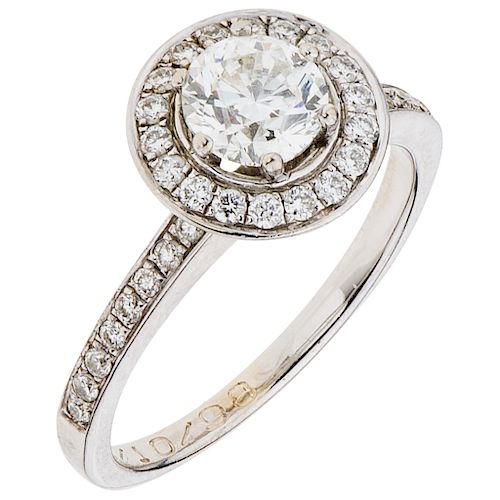 A diamond (one GIA certified) 14K white gold ring.