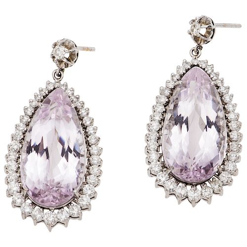 An amethyst and diamond 18K white gold pair of earrings.