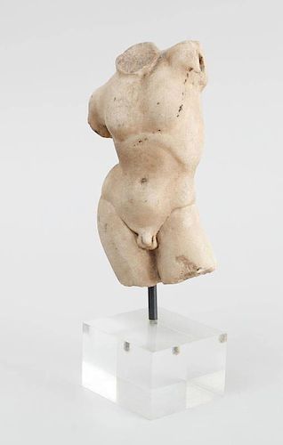 ROMAN CARVED MARBLE TORSO OF AN ATHLETE, AFTER THE ANTIQUE