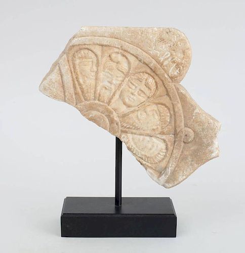 RELIEF-CARVED MARBLE FRAGMENT, AFTER THE ANTIQUE