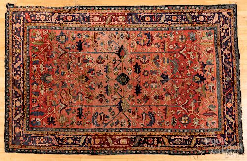 Hooked rug, in the style of a Serapi