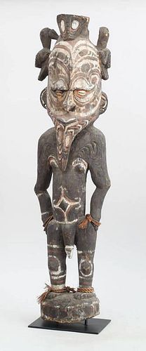 PAPUA NEW GUINEA CARVED WOOD, POLYCHROME AND SHELL STANDING FIGURE, SEPIK RIVER