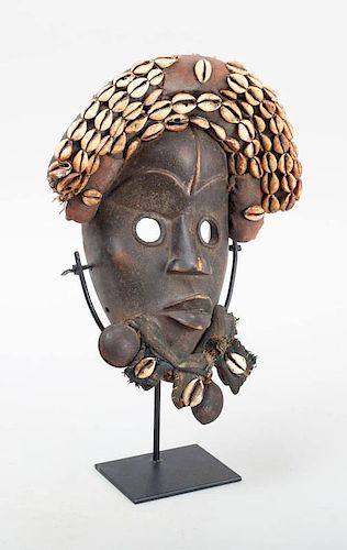 AFRICAN SHELL-MOUNTED CARVED WOOD MASK