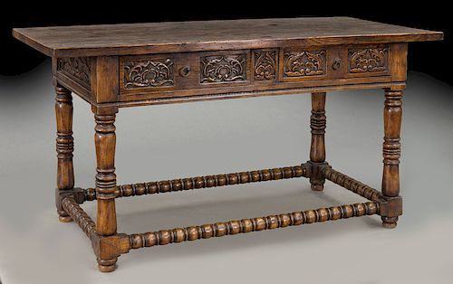 Spanish Renaissance style two drawer table,