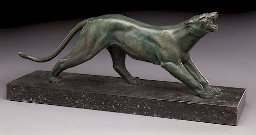 Patinated bronze figure of a panther raised on a