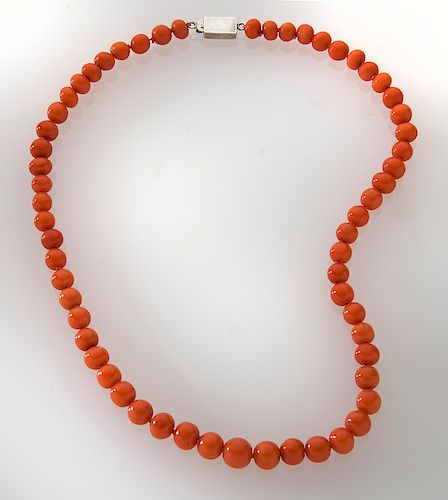 Coral beaded necklace featuring graduating