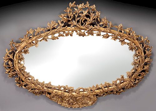 Italian wood carved and gilt mirror,