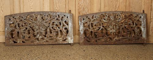 PAIR CAST IRON MASK AND SCROLL WINDOW GUARDS