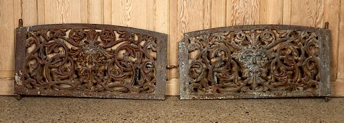 PAIR CAST IRON MASK AND SCROLL WINDOW GUARDS