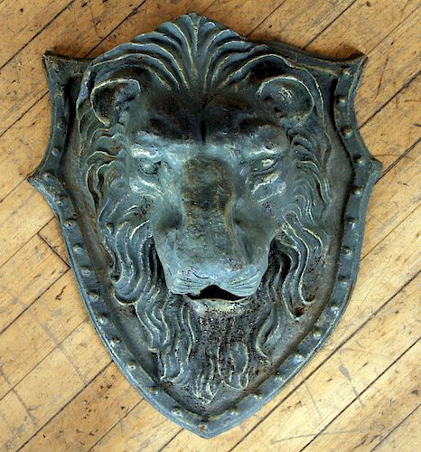 GREEN PAINTED CAST IRON LION ON SHIELD PLAQUE