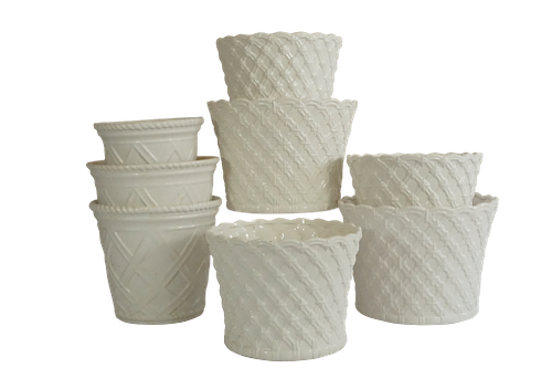 Group of Eight White Cachepots 