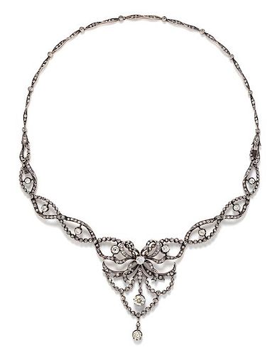A Belle Epoque Silver Topped 18 Karat Yellow and Diamond Festoon Necklace, French, 22.40 dwts.