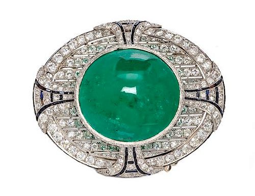 An Art Deco Platinum, Emerald, Diamond and Onyx Brooch, 49.90 dwts.