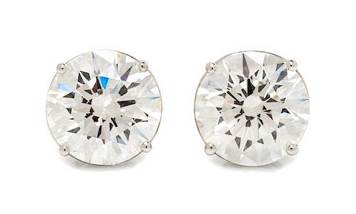 A Pair of Platinum and Diamond Stud Earrings, 2.70 dwts.