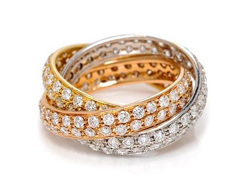 An 18 Karat Tricolor Gold and Diamond Rolling Ring, Italian, 5.40 dwts.