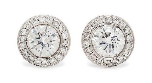 A Pair of White Gold and Diamond Stud Earrings, 1.60 dwts.