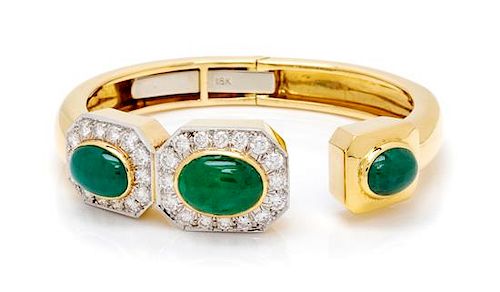 An 18 Karat Yellow Gold, Platinum, Emerald and Diamond Bangle Bracelet, 33.60 dwts.