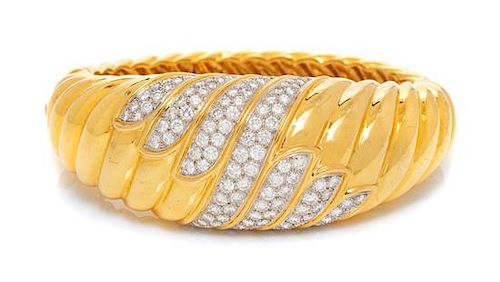 An 18 Karat Yellow Gold, Platinum, and Diamond Bangle Bracelet, Montreaux, 50.40 dwts.