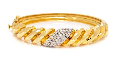 An 18 Karat Yellow Gold and Diamond Bangle Bracelet, Mitchell Rotkel, 28.20 dwts.