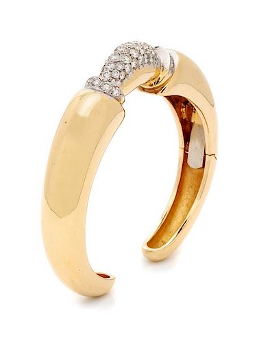 A Bicolor Gold and Diamond Cuff Bracelet, 26.80 dwts.