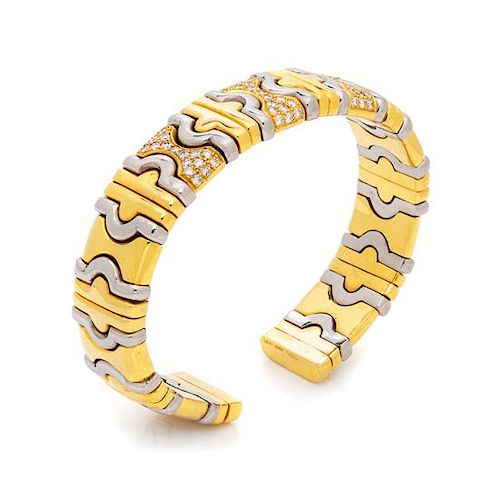 An 18 Karat Yellow Gold, Steel and Diamond Cuff Bracelet, Dino Ceva, 39.00 dwts.