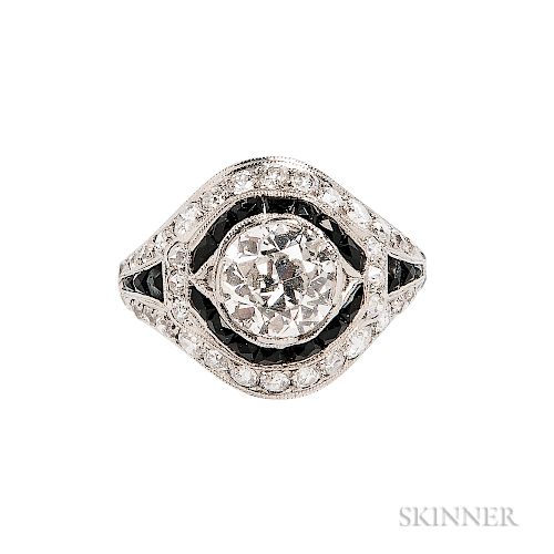 Platinum and Diamond Solitaire, set with an old European-cut diamond weighing approx. 1.10 cts., with fancy-cut onyx and old European-c