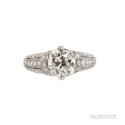 Art Deco Platinum and Diamond Ring, set with an old European-cut diamond weighing approx. 1.80 cts., old European-cut diamond melee, mi