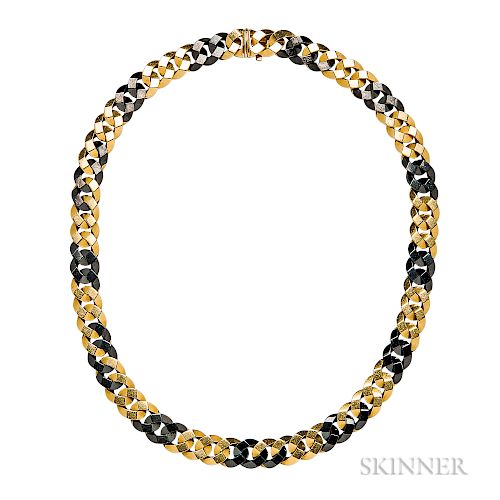 18kt Gold and Blackened Steel Necklace, Bulgari, New York, 65.2 dwt, lg. 16 1/8 in., no. V825, signed.