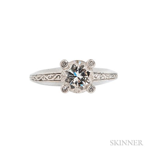 Platinum and Diamond Solitaire, Stephen Webster, prong-set with a full-cut diamond weighing approx. 1.15 cts., the prongs set with full