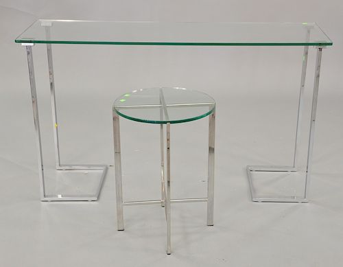 Two chrome and glass tables including one hall table (ht. 30 in., 16" x 52") and one small round table (ht. 23 in.) 
Provenance: Est...