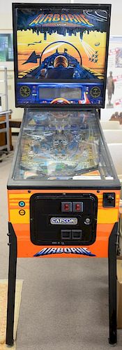 Capcom Airborne pinball machine, coin operated, working condition (ball gets stuck occasionally). ht. 79 in., wd. 28 in., dp. 53 in.