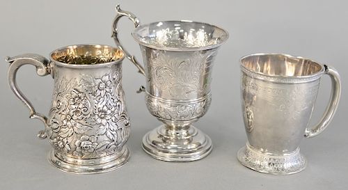 Three silver mugs including one English probably 18th century, one Wm. Tenney N.Y., and one Gorham sterling silver. ht. 4 in., 4 1/2...