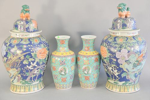 Four Chinese porcelain pieces to include a pair of large Chinese porcelain jars with covers, having foo dog finials (ht. 27 1/2 in.)...