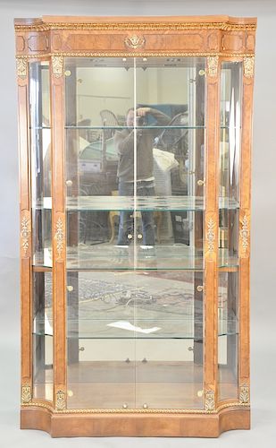 Pair of Henredon crystal cabinets, each with bowed glass, two doors, and glass shelves. ht. 74 1/4 in., wd. 48 in., dp. 18 in.