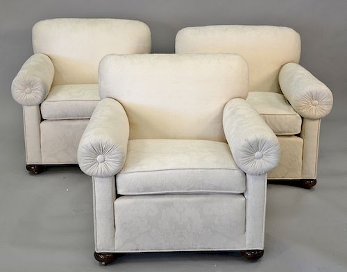 Four upholstered chairs.