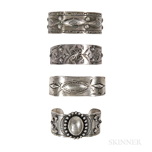 Four Navajo and Mexican Silver Band Bracelets