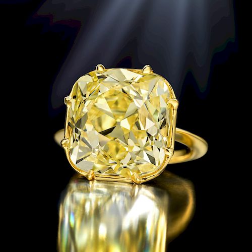 A Magnificent 23.26-Carat Fancy Intense Yellow Old Mine-Cut Diamond Ring