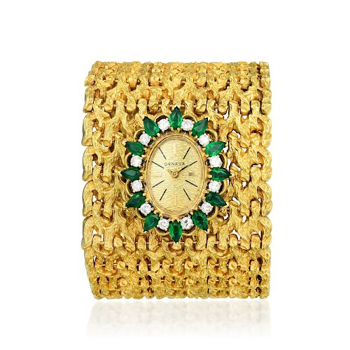 A Wide Emerald and Diamond Watch Bracelet