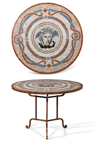 An Italian mosaic and wrought iron center table
