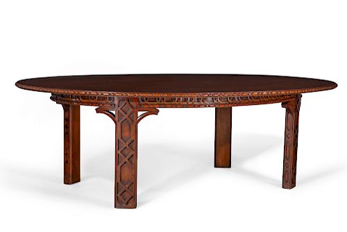 A  George III style  mahogany oval dining table